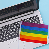Open Laptop with LGBTQ Pride Rainbow Flag